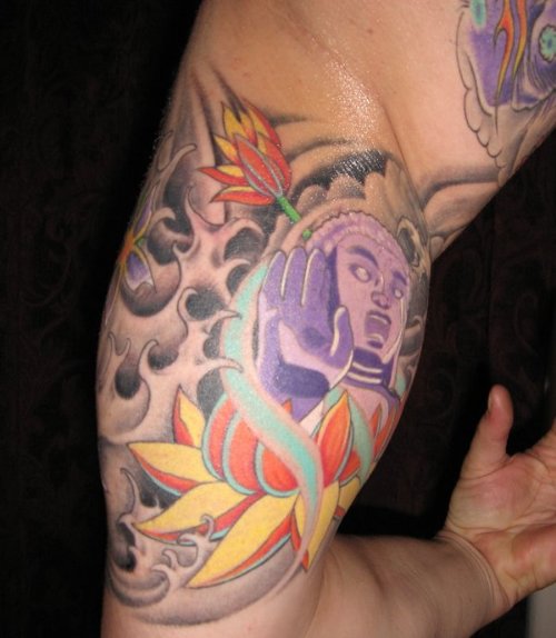 Lotus Flower And Buddha Illusion Tattoo On Bicep
